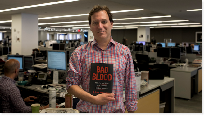 Picture of John Carreyrou with his book Bad Blood. Courtesy of Benjamin Meteyer